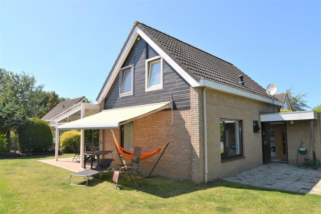 Holiday Home Mosselbank: Seaside Retreat with Private Garden Ouddorp Exterior photo